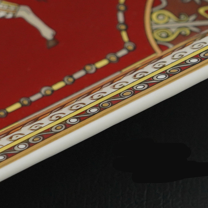 Large red color ashtray with a horse pattern, gold and twoo sigar slots