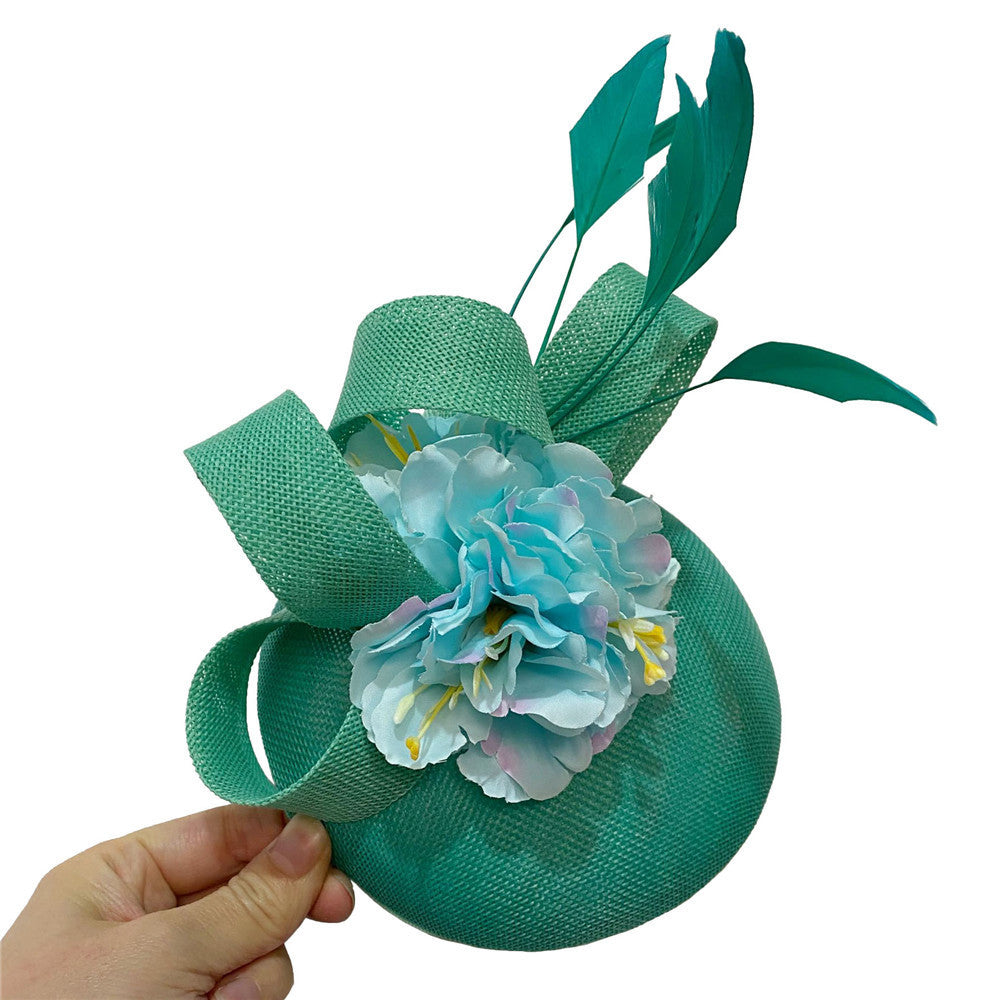 Derby Hat with Flowers and Linen Bow Arrangment
